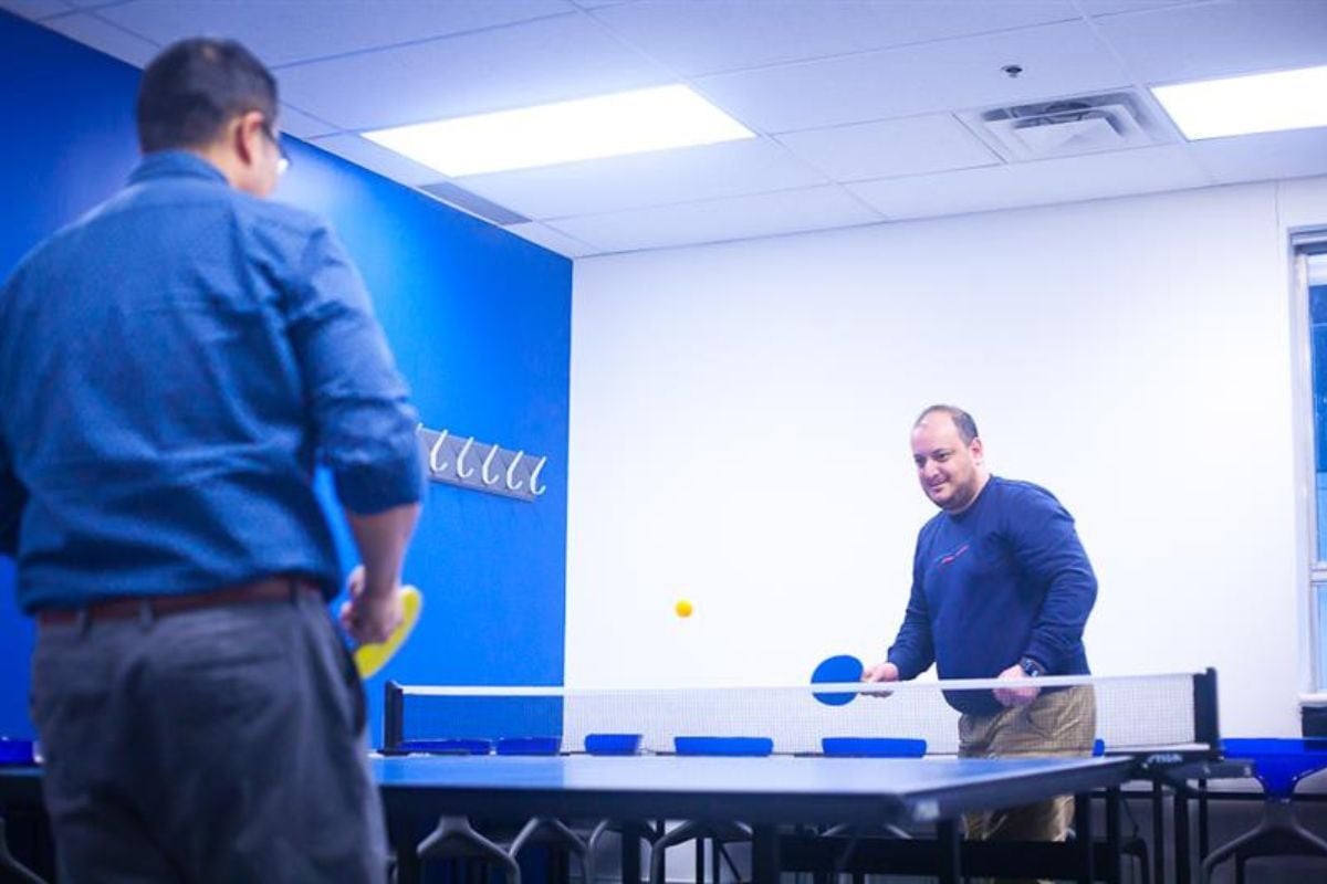 Students playing table tennis