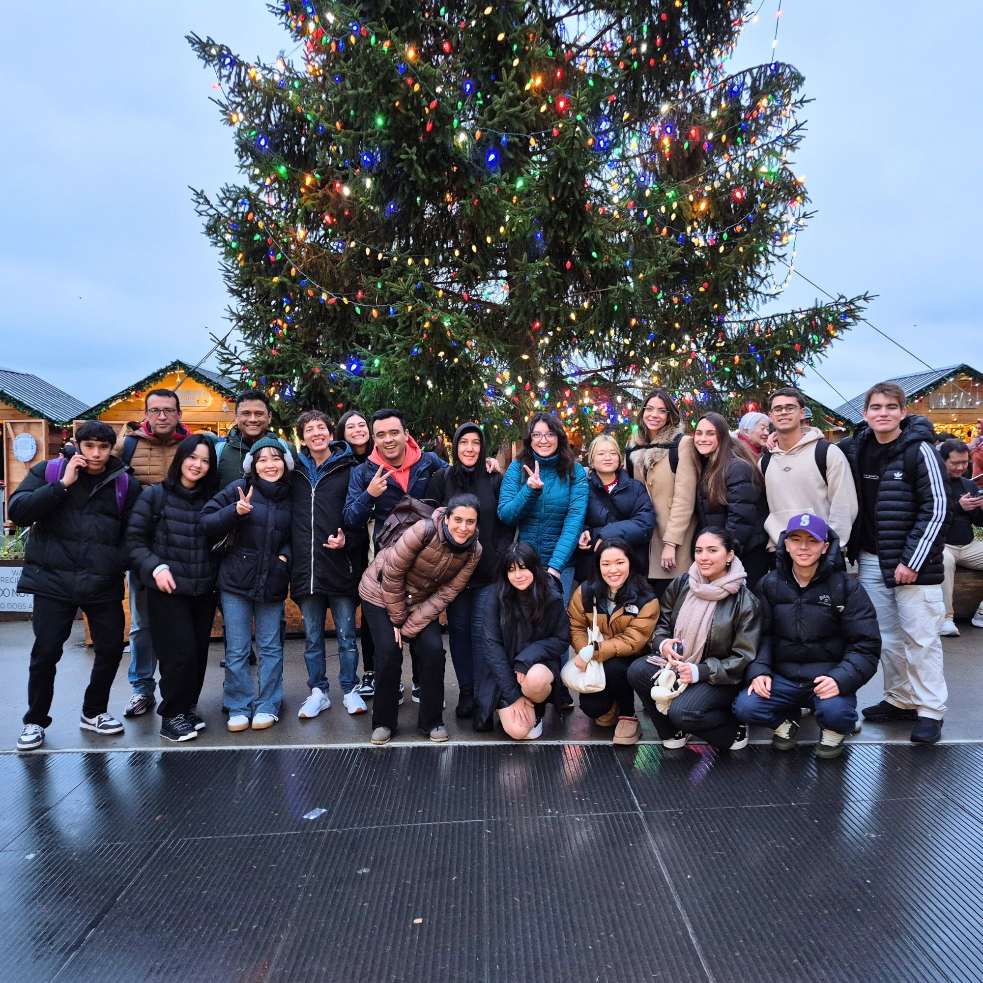 Group of students with a christmas tree