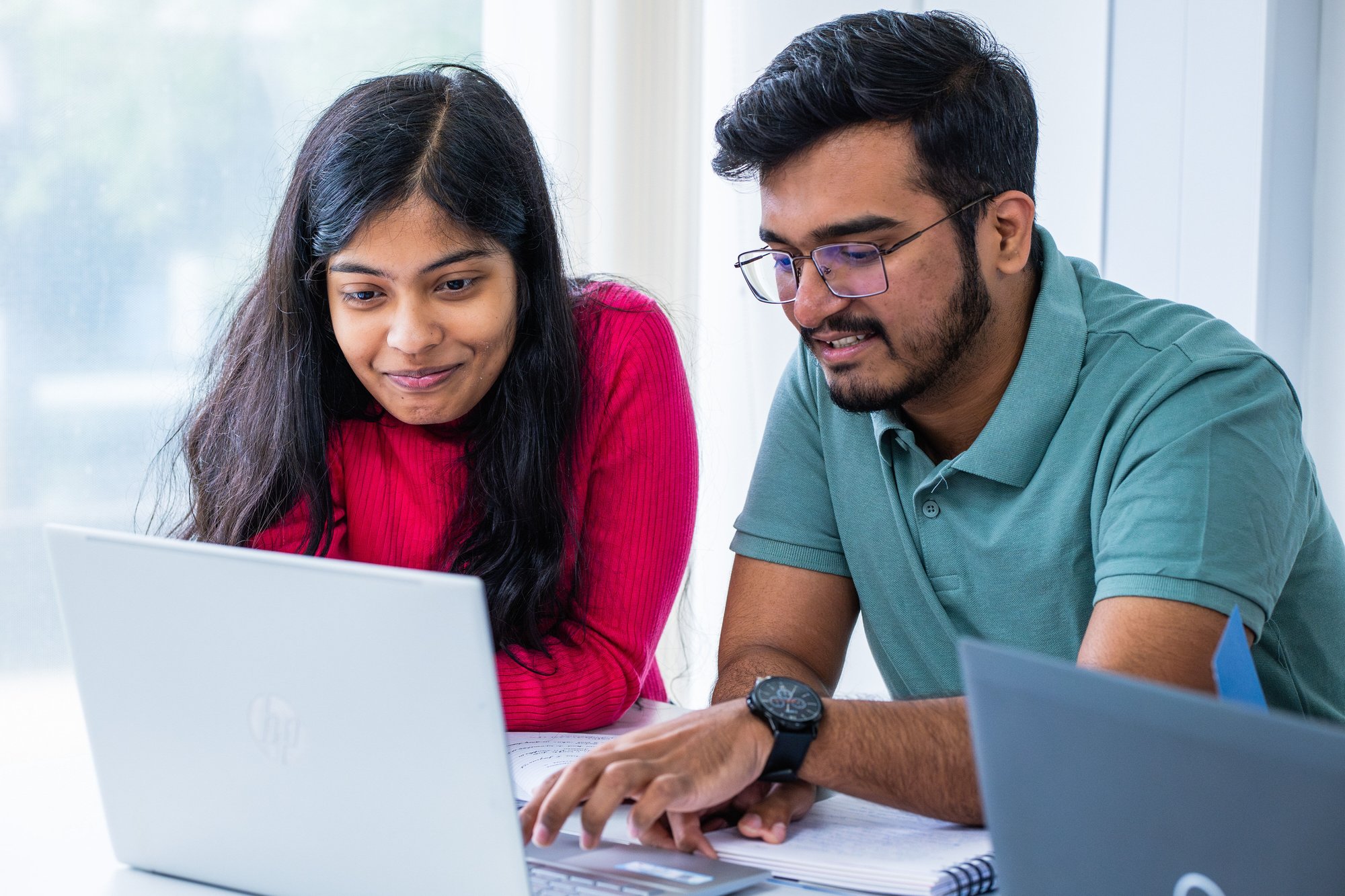Students working at a desk