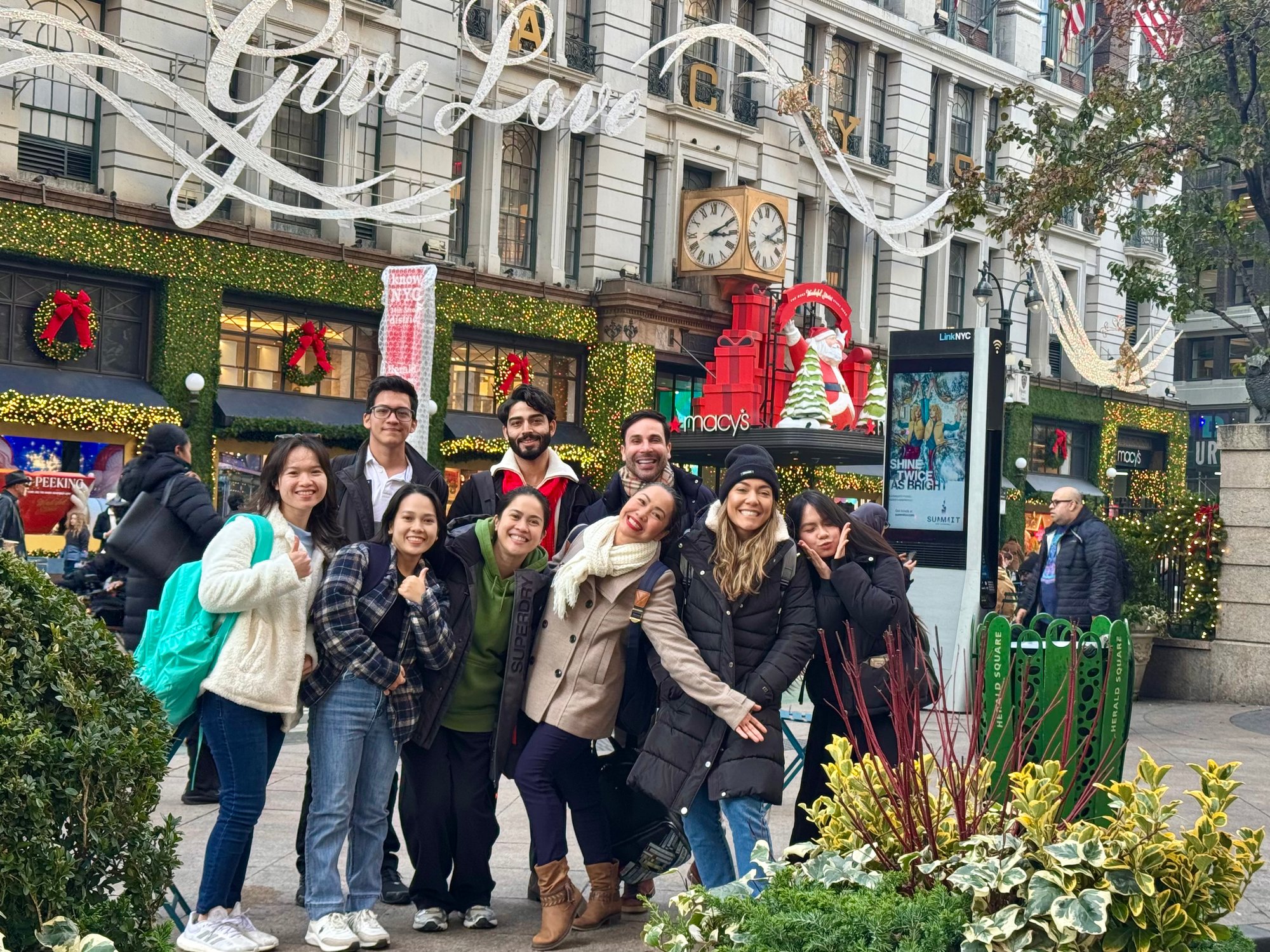 NYC students enjoying christmas outside Macys