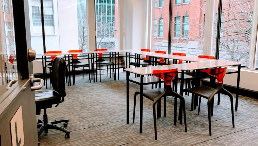 Classroom in vancouver with red chairs